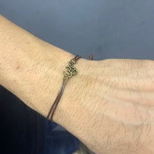 Load image into Gallery viewer, Om (Antique) Wrist Band
