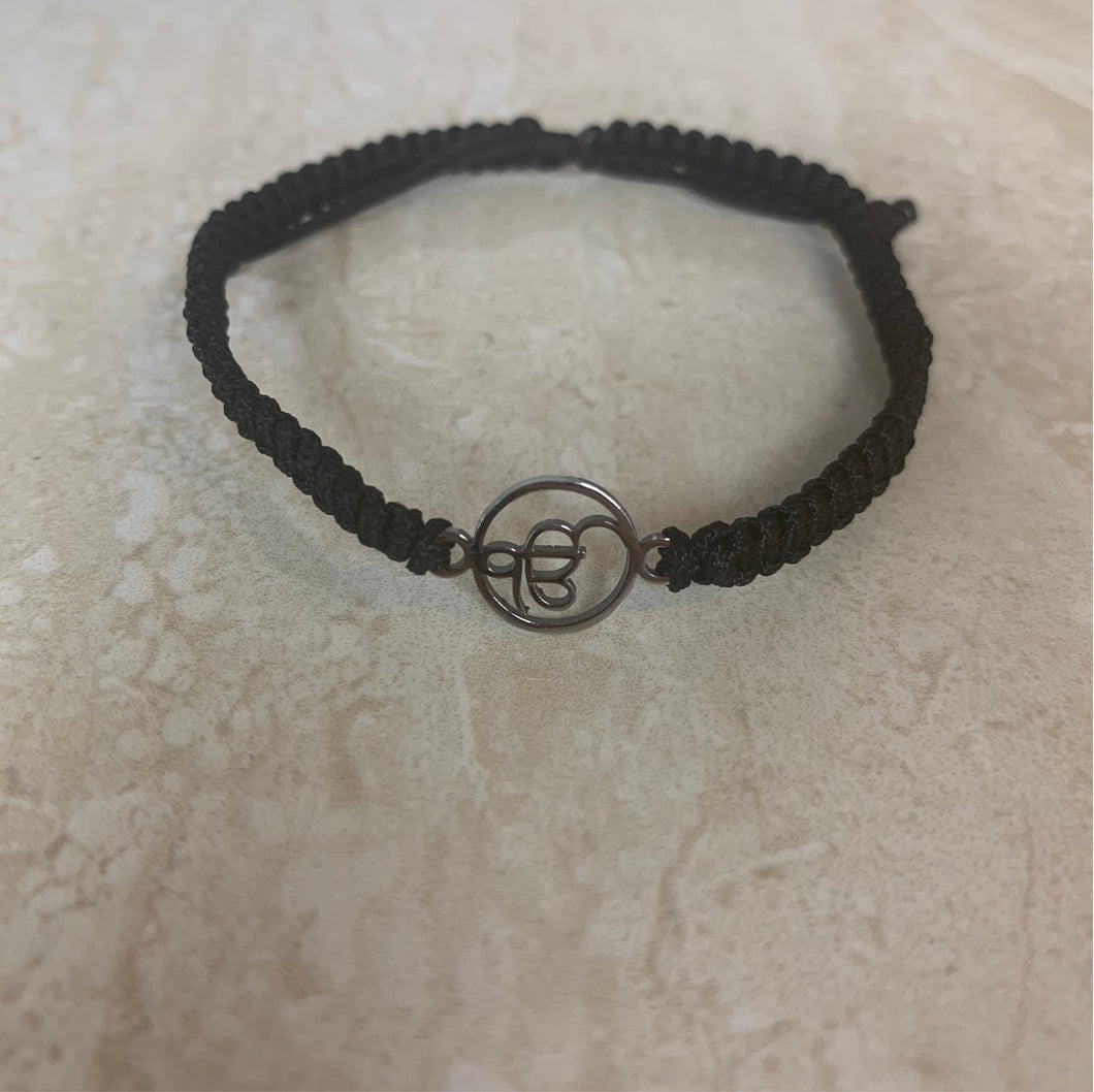 Black Macrame Cord Bracelet with Ek Onkar Pendant and Gems - Bonds of  Divinity | NOVICA
